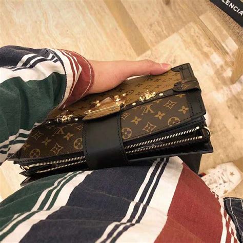 grey louis vuitton clutch yellow lettering|Louis Vuitton monogram reverse.